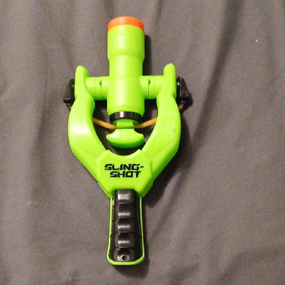 Green and Black Sling Shot